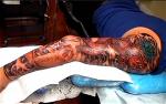 tattoo-video-garden-grove-koi-fish-color-full-arm-